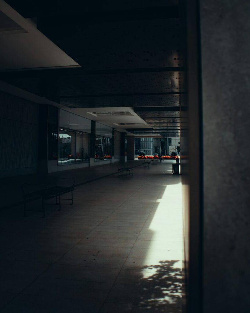 Quiet modern corridor representing discreet private security